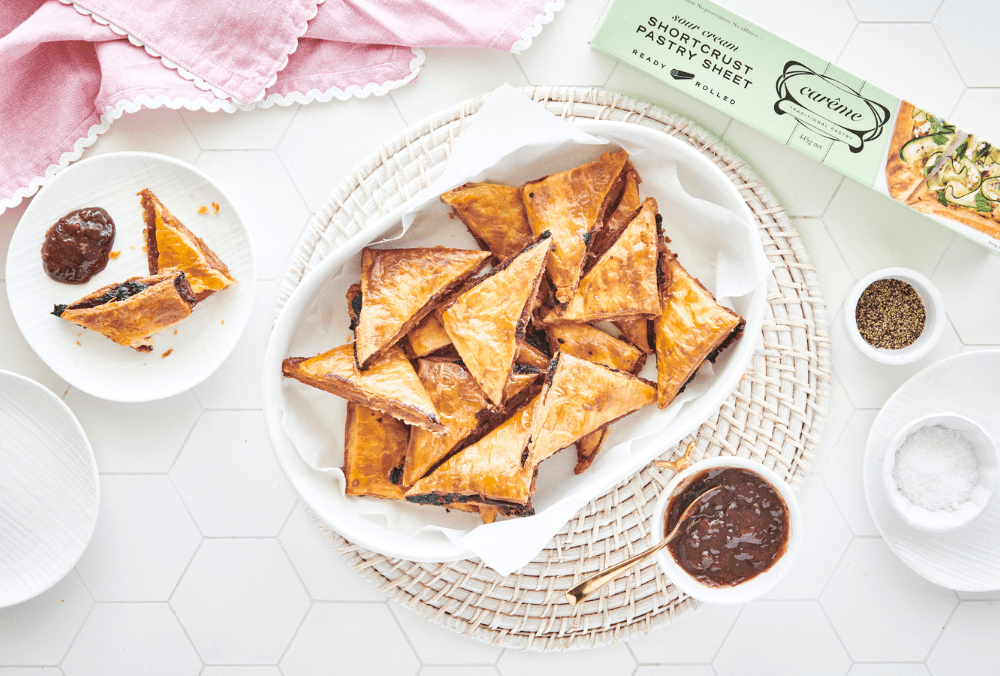 These leftover 'toasties' will have mouths watering and become a family favourite Boxing Day recipe tradition. Breathe new life into Christmas ham leftovers by combining them with a zesty chutney and your favourite strong hard cheese. A festive filling to a tempting pastry sandwich!